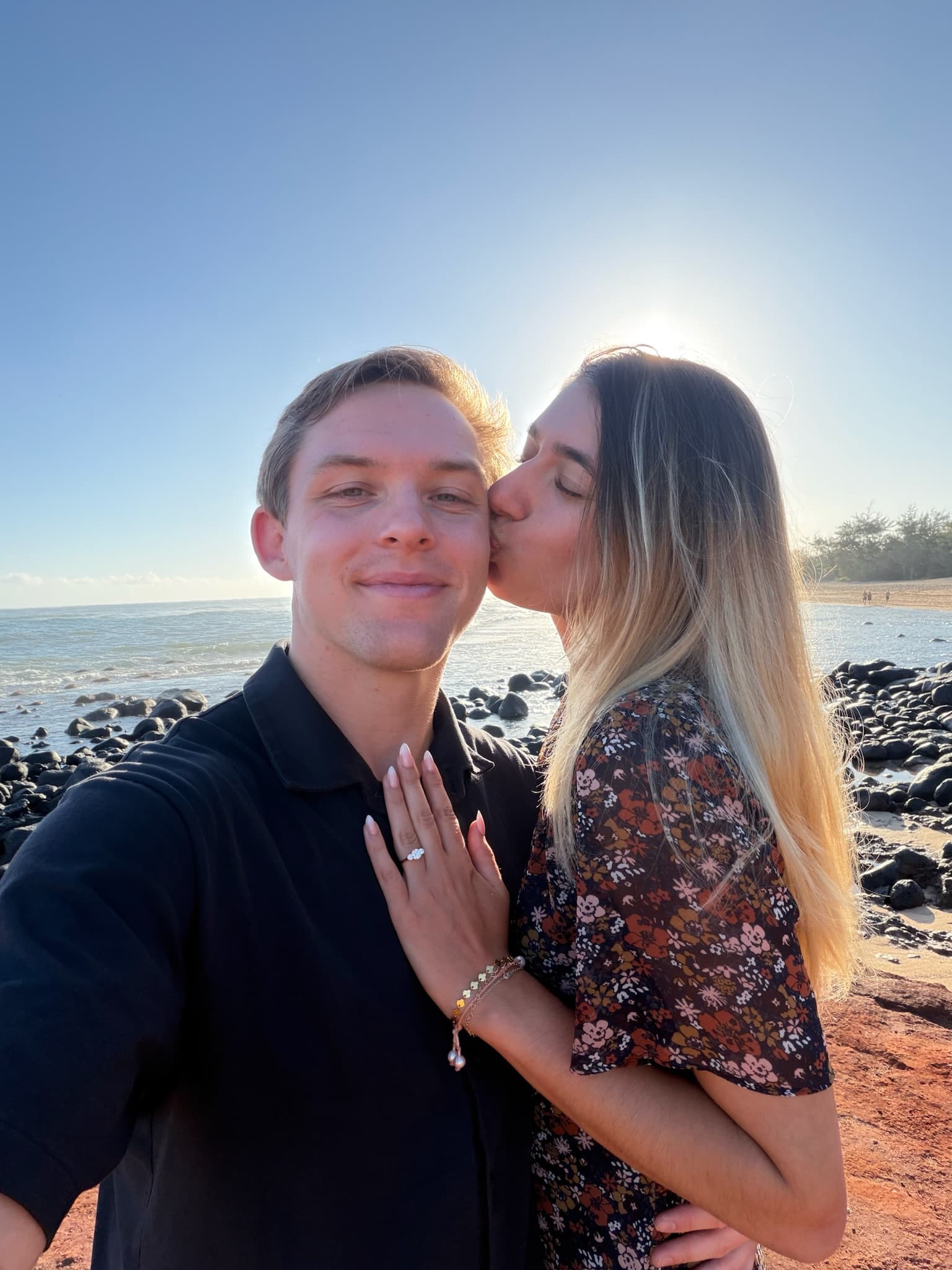 A kiss on the rocky shoreline — Hawaii, April 2026